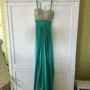 Beautiful prom dress worn once, excellent condition. No rips, stains or tears.